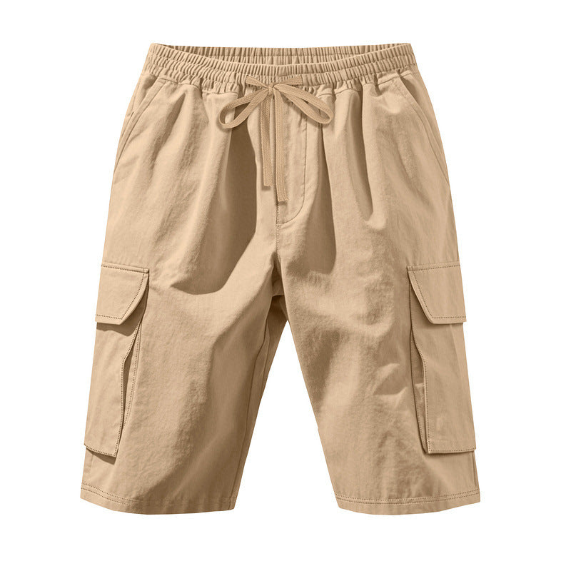 Men's knee-length utility shorts made of lightweight cotton blend with elastic drawstring waistband and patch flap pockets StylebySassy