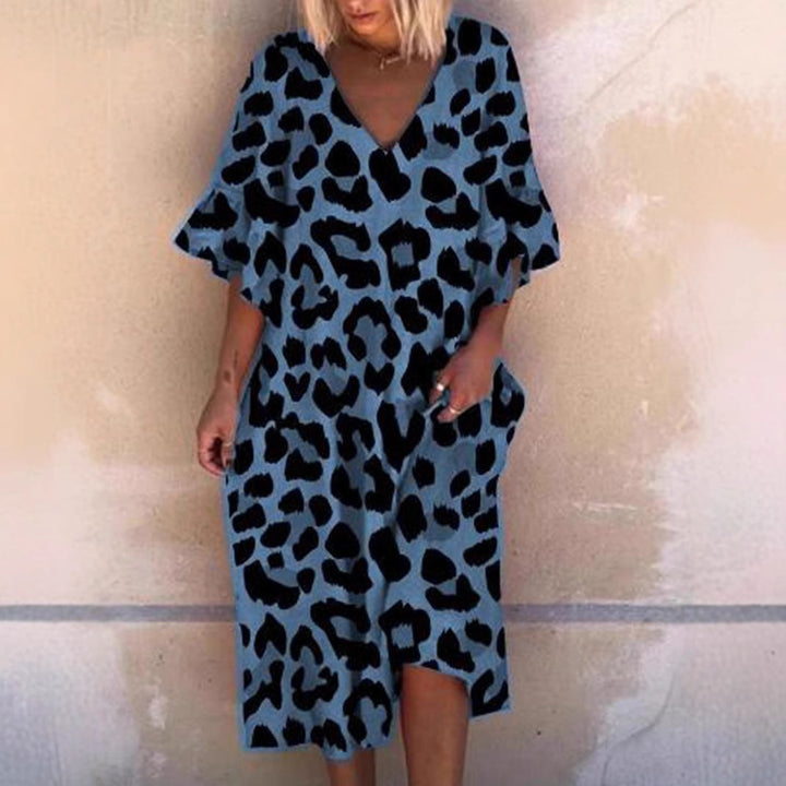 Ladies' casual midi dress in tunic style with V-neck, ruffled sleeves, and side pockets StylebySassy