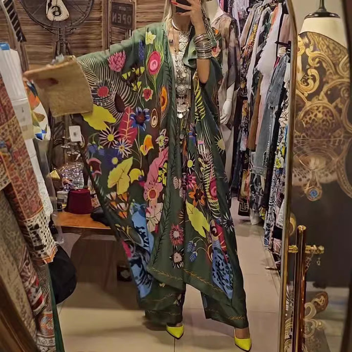 Women's extravagant maxi kaftan two-piece set with wide kimono sleeves, flared palazzo pants, and expressive floral print StylebySassy
