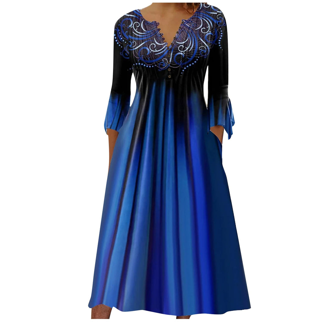 Women's flowing maxi dress with embellished V-neck, underbust seam, flared skirt and side pockets StylebySassy