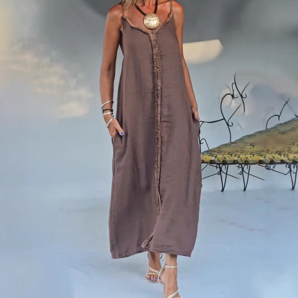 Women's airy linen-look maxi strap dress with fringed center seam and inset pockets StylebySassy