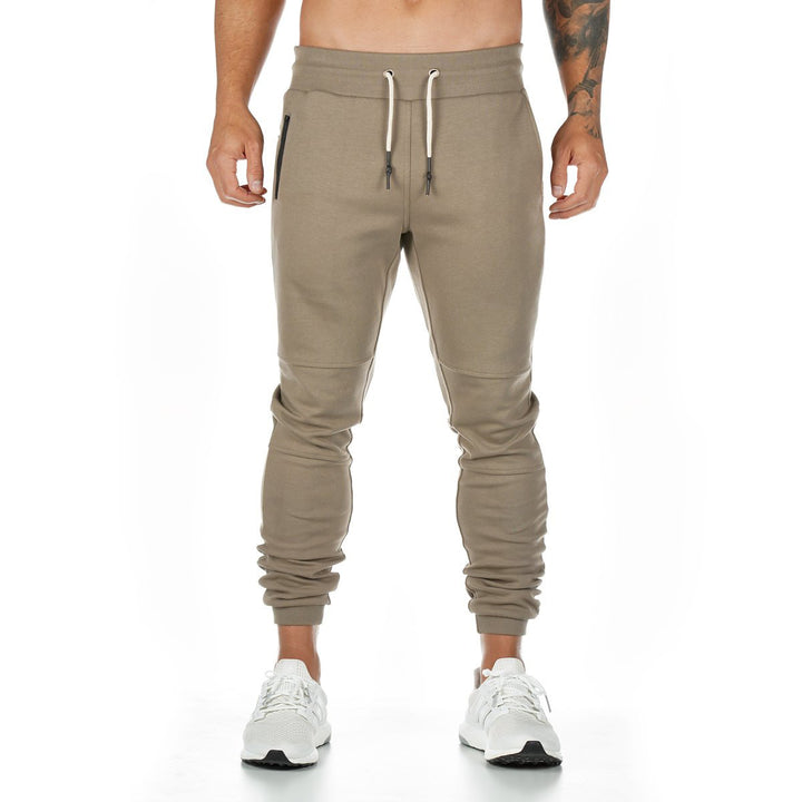 Men's narrow-cut joggers with ribbed waistband, zip pocket, and knee darts StylebySassy