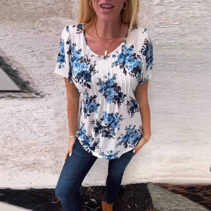 Women's short-sleeve blouse with box pleats, round neckline and floral all-over print StylebySassy