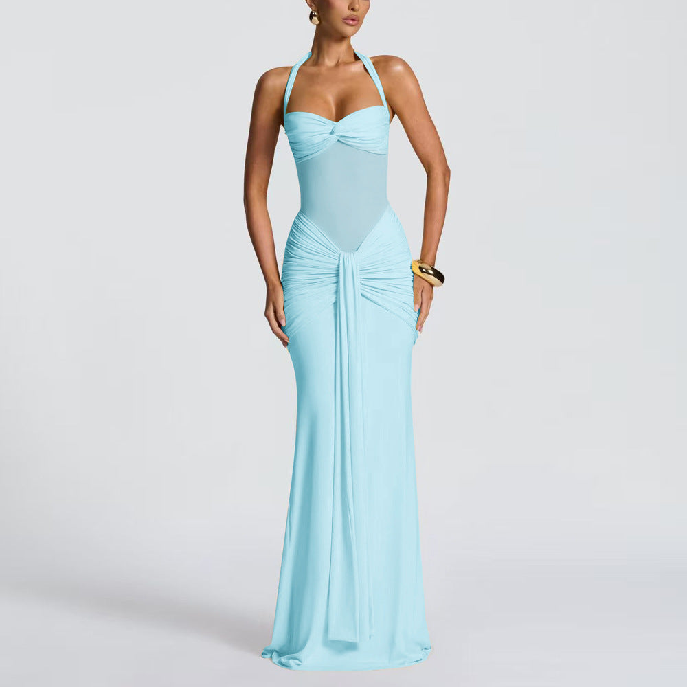 Women's figure-hugging halter evening dress with transparent mesh insert and gathered hip area StylebySassy