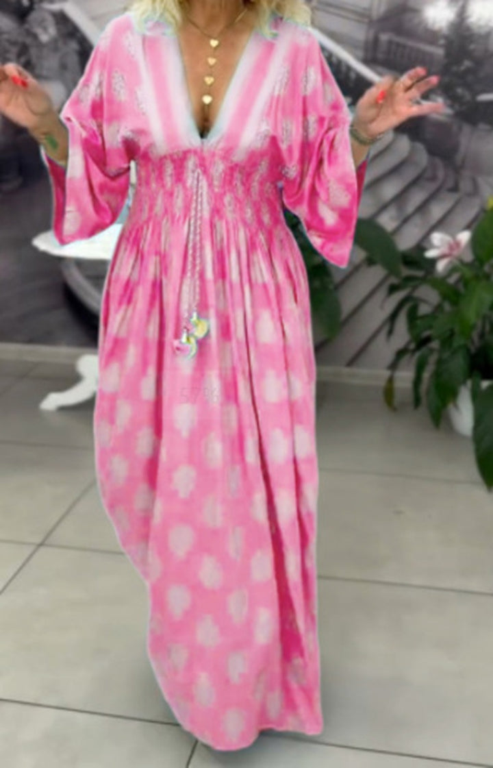 Women's gathered maxi dress with smocked waist, kimono sleeves, and decorative tassel StylebySassy