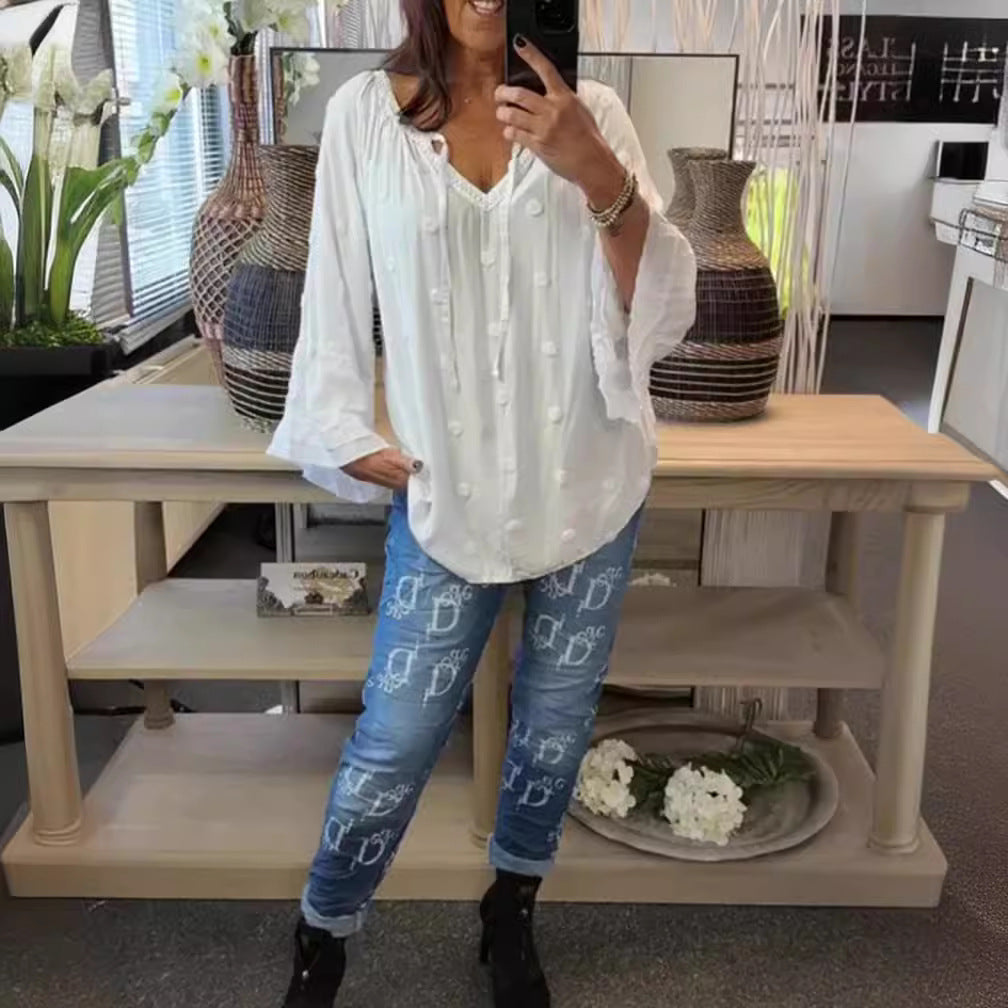 Women's lightweight Boho tunic with V-neck, three-dimensional dot texture and ruffle bell sleeves StylebySassy