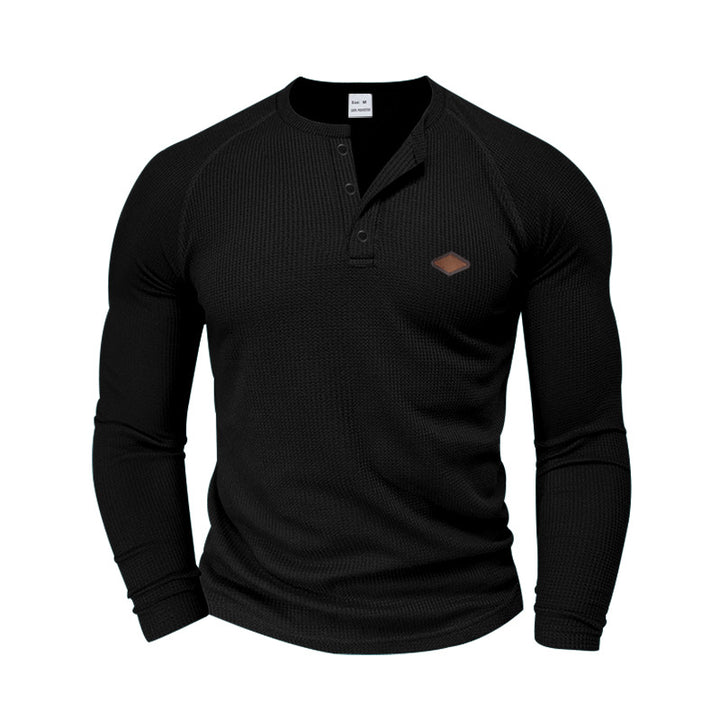 Men's structured waffle Henley shirt with short button placket, raglan sleeves, and leather patch StylebySassy