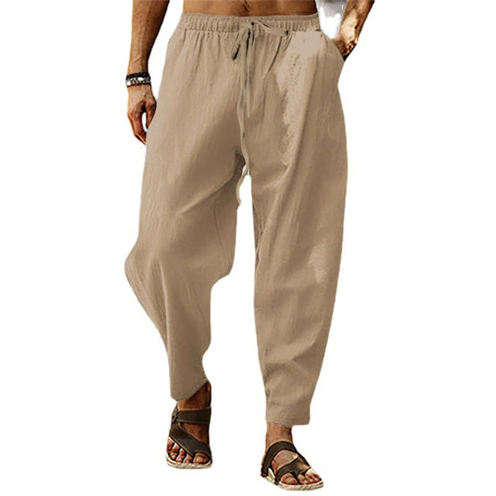 Men's relaxed summer slouch pants made of linen blend with elastic waistband and tapered ankle cuffs StylebySassy