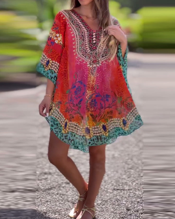 Women's short tunic kaftan with embellished V-neck and floral-animal border StylebySassy