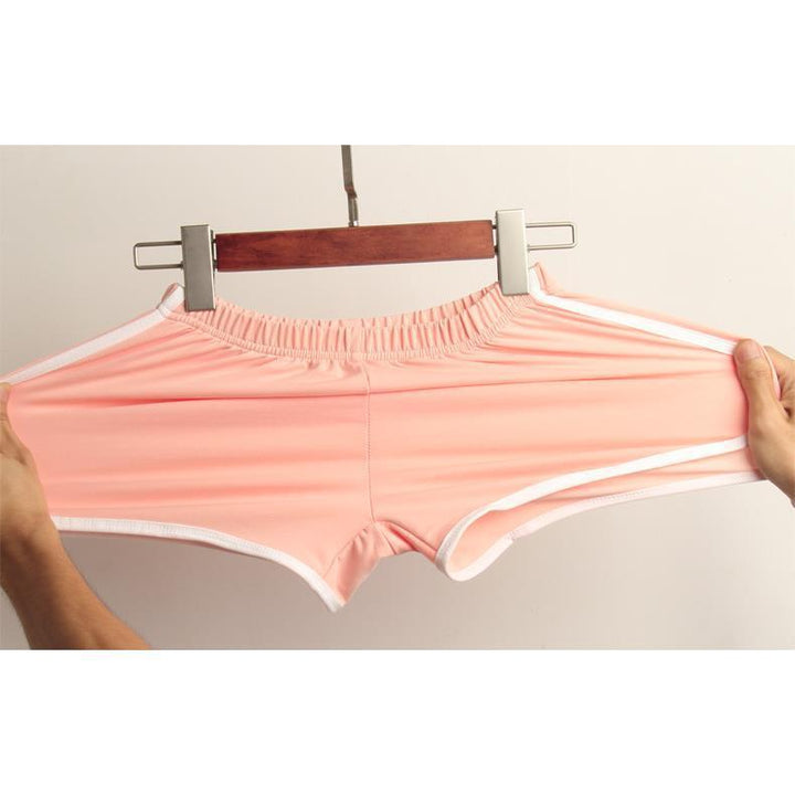 Women's sporty shorts with elastic waistband and contrasting stripes StylebySassy