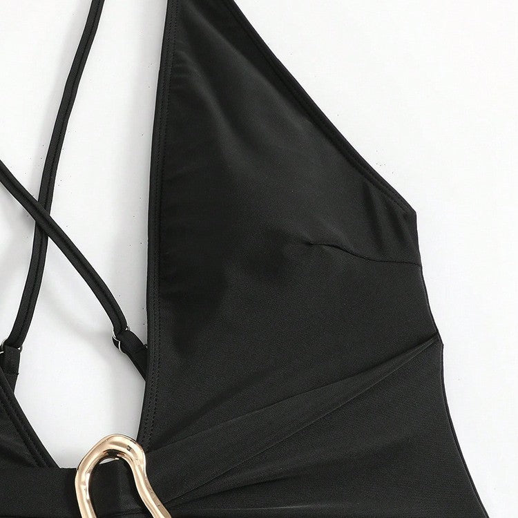 Women's one-piece swimsuit with deep V-neckline and elegant decorative element StylebySassy