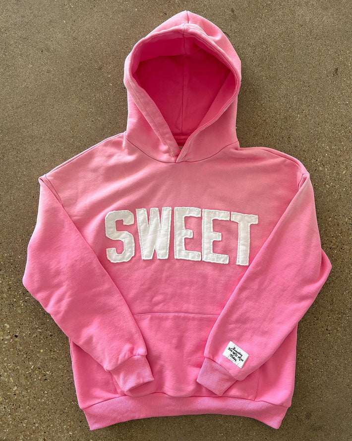 Unisex nan oversized hoodie with appliquéd letter patches and kangaroo pocket StylebySassy