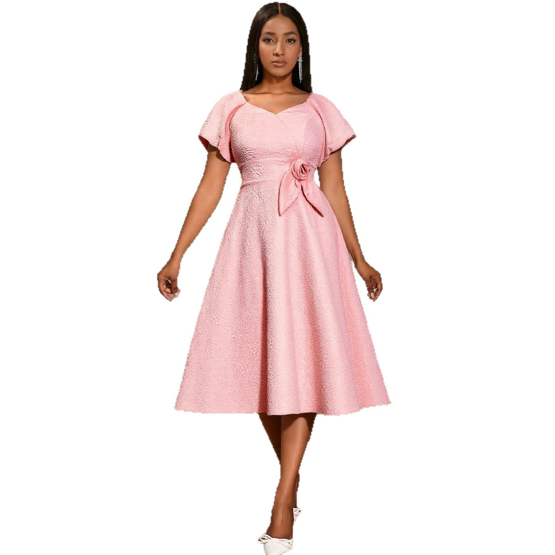 Ladies elegant dress with peplum, floral applique and puff sleeves StylebySassy