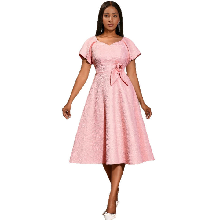 Ladies elegant dress with peplum, floral applique and puff sleeves StylebySassy
