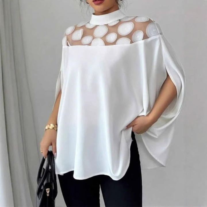 Women's elegant tunic blouse with stand-up collar, transparent round application panel and cape sleeves StylebySassy