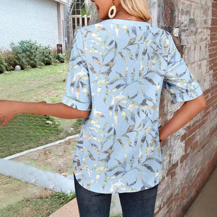 Women's lightweight structured tunic blouse with Henley neckline and patch breast pockets StylebySassy