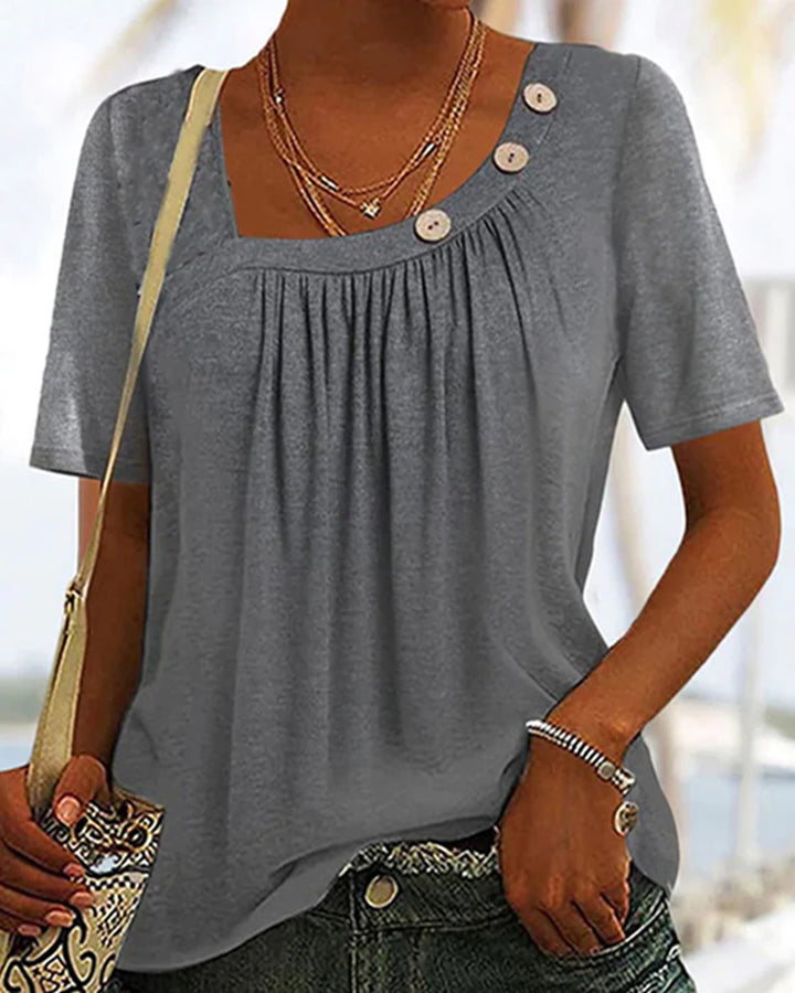 Women's boxy short-sleeve shirt with square neckline, gathered bust area and decorative button detail StylebySassy