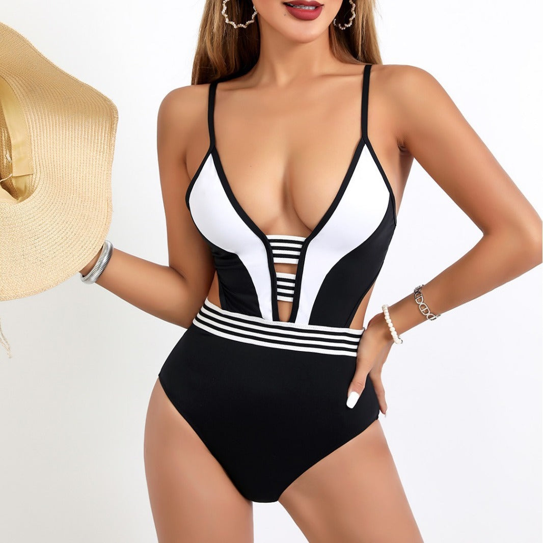 Women's Sporty One-Piece Swimsuit with Deep V-Neck and Side Cut-Outs StylebySassy