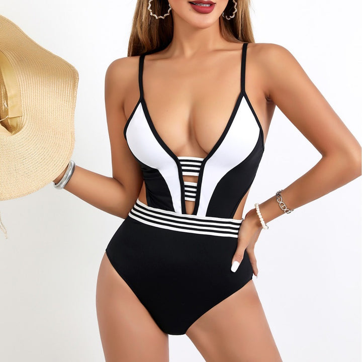 Women's Sporty One-Piece Swimsuit with Deep V-Neck and Side Cut-Outs StylebySassy