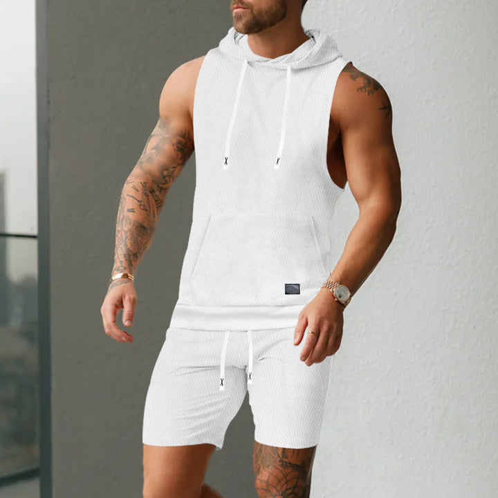 Men's sleeveless hoodie vest set made of textured cotton blend with kangaroo pocket and drawstring shorts StylebySassy