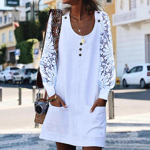 Women's relaxed linen mini dress with floral crochet sleeves, U-neckline and patch pockets StylebySassy