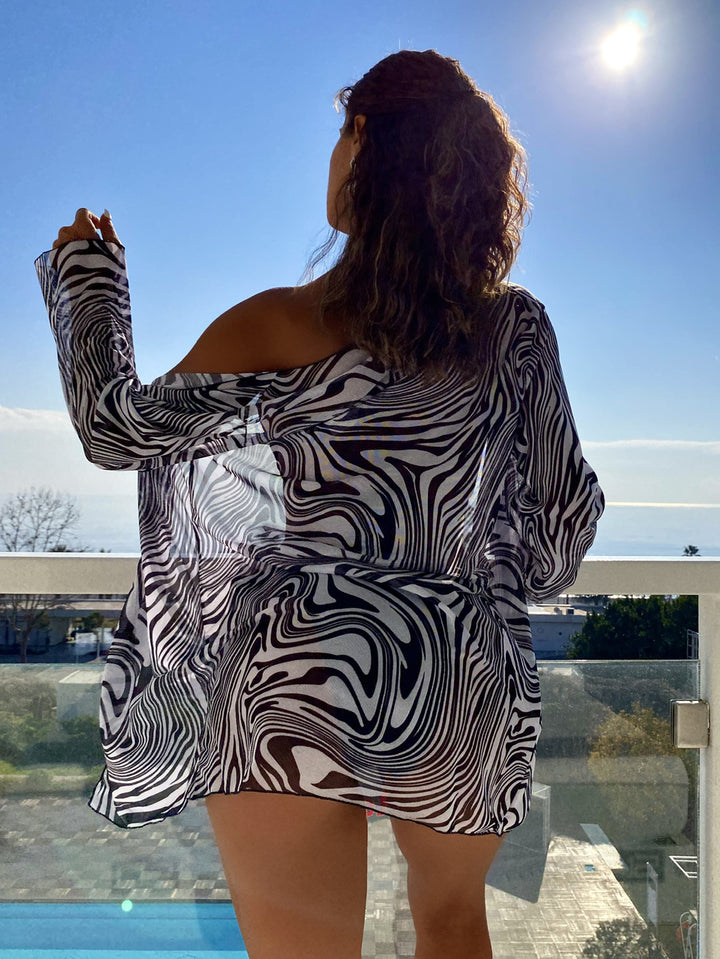 Women's lightweight beach dress with asymmetrical cut and stylish pattern StylebySassy