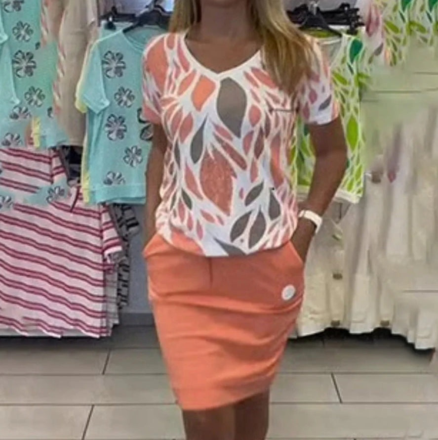 Ladies casual jersey two-piece set with printed V-neck shirt and knee-length pencil skirt with pockets StylebySassy