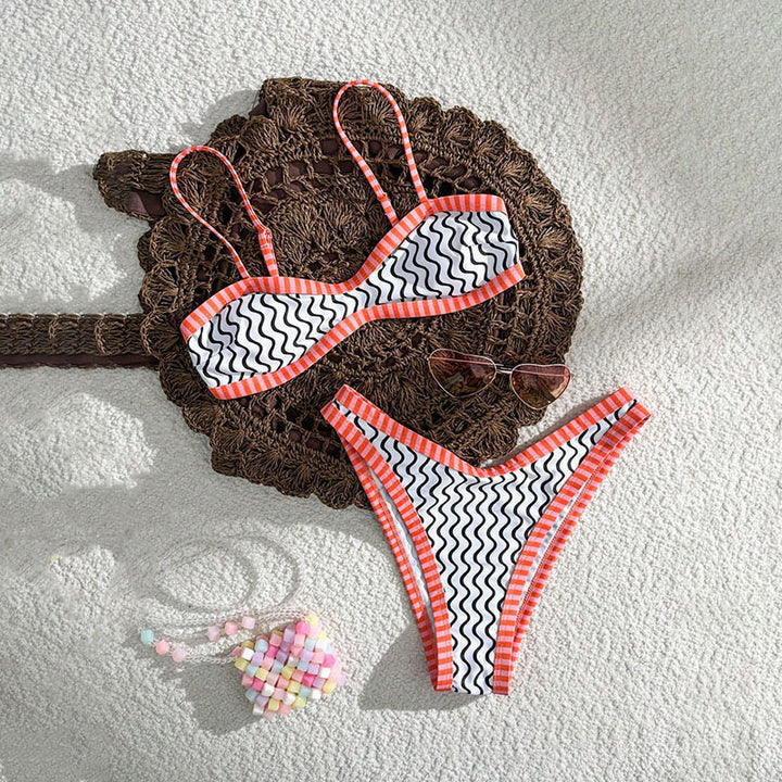 Women's bikini set with textured wave pattern and sporty strap design StylebySassy