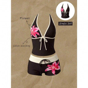 Women's tankini with fashionable polka dot pattern and adjustable halter StylebySassy