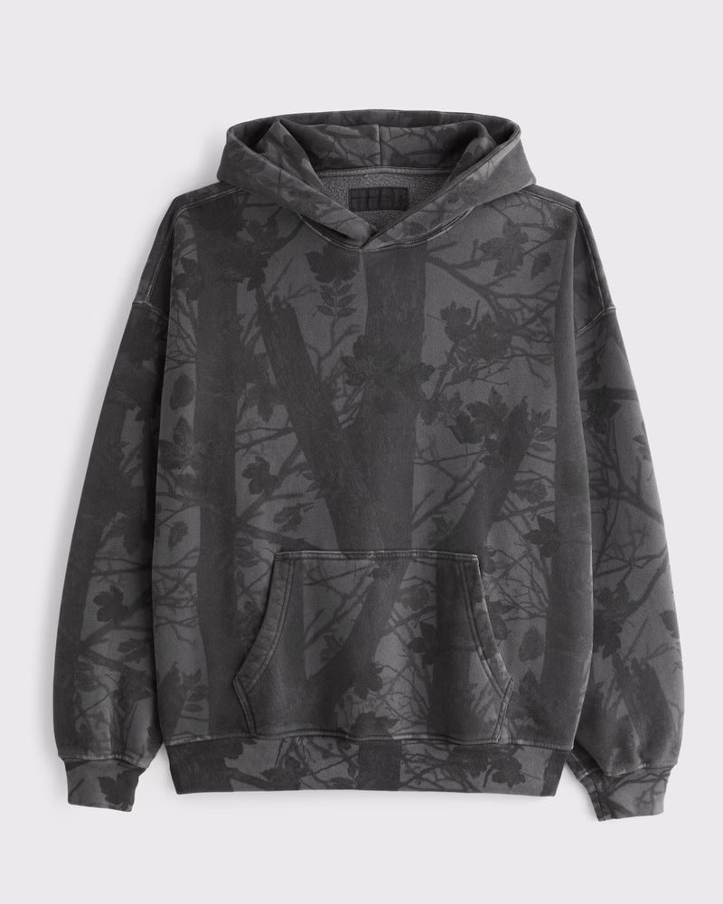 Unisex loose-fit hoodie sweatshirt with subtle leaf texture, double hood without drawstring and kangaroo pocket StylebySassy