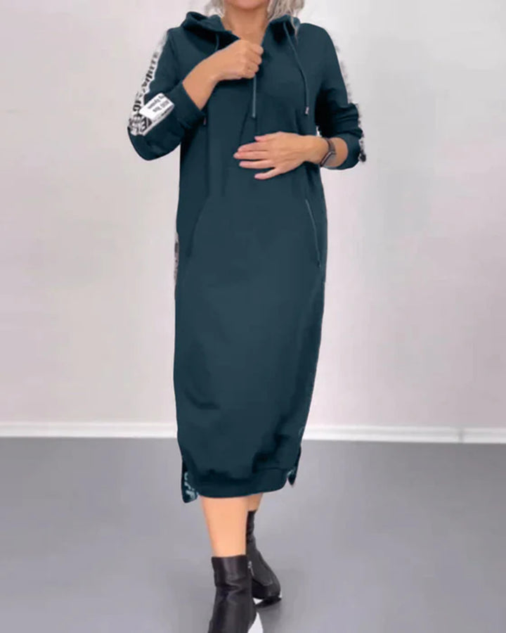 Women's ankle-length hooded sweatshirt dress with half zip, kangaroo pockets and side decorative piping StylebySassy