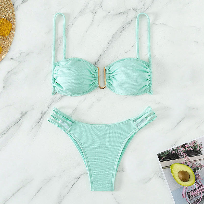 Women's bikini set with modern ruffle details and elegant golden accent StylebySassy