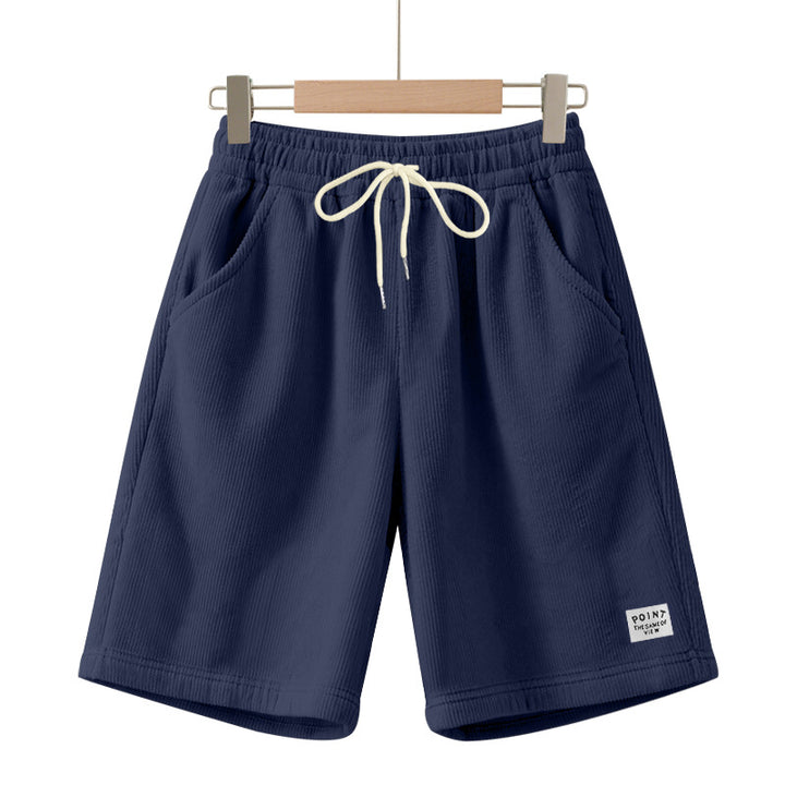 Men's knee-length lounge shorts in ribbed structure jersey with elastic drawstring waistband and patch pockets StylebySassy