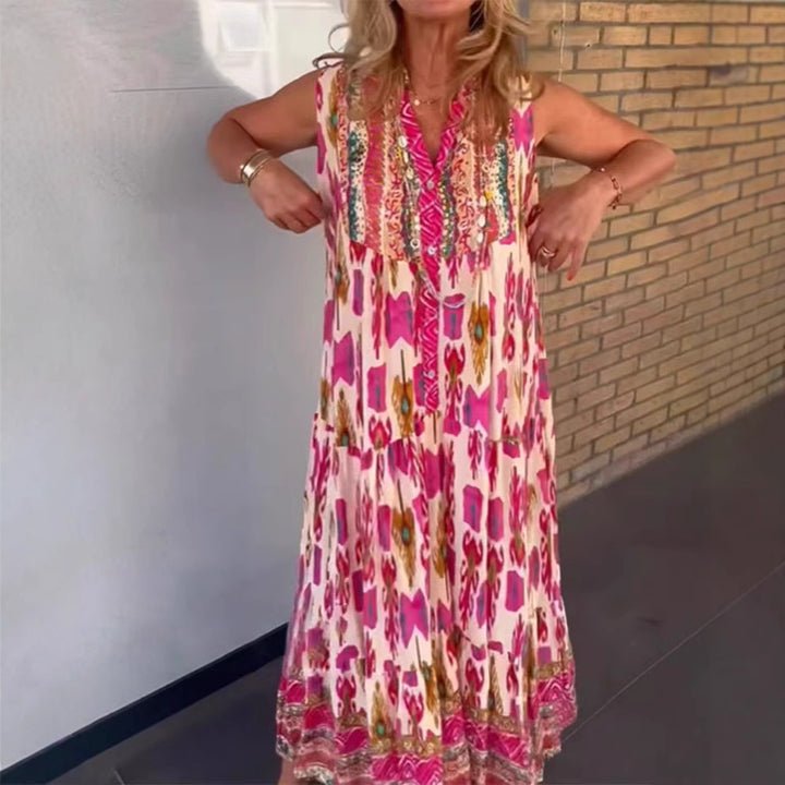 Ladies' flowing maxi dress in boho style with V-neck, tiered skirt and embroidered yoke StylebySassy