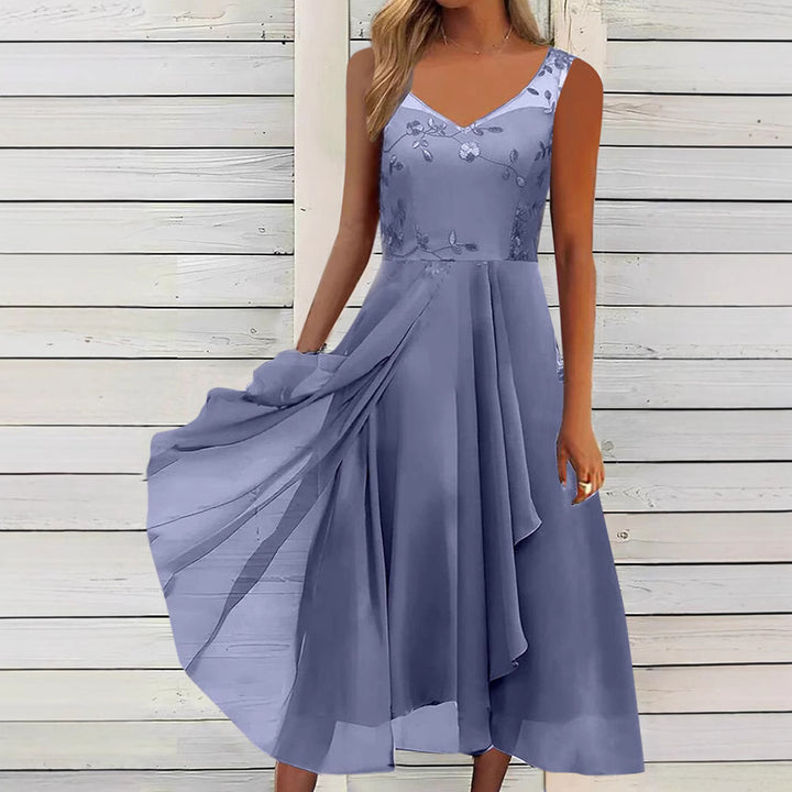 Women A-line chiffon dress with floral embroidered bodice, V-neck, draped godet swing and concealed side pockets StylebySassy