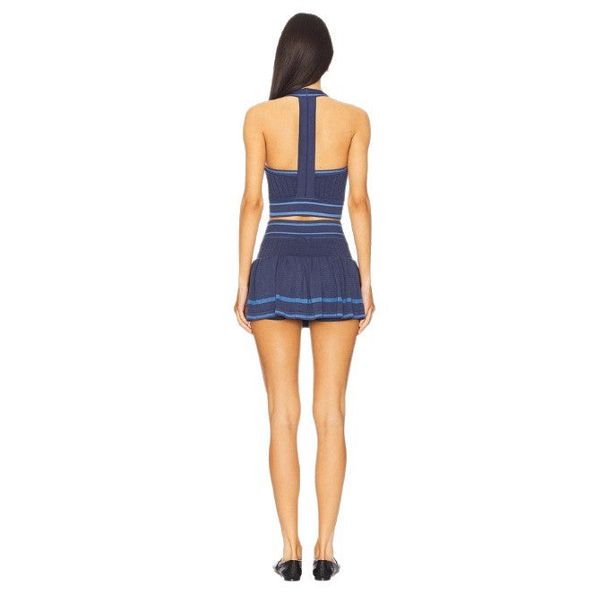 Women's knitted two-piece set with narrow straps, fitted crop top and pleated mini skirt in tennis style StylebySassy