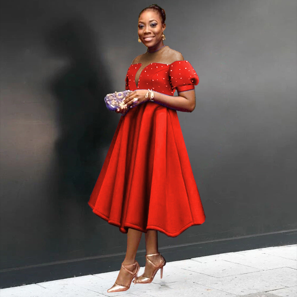 Women's festive midi dress with ruffled sleeves and shimmering accents StylebySassy