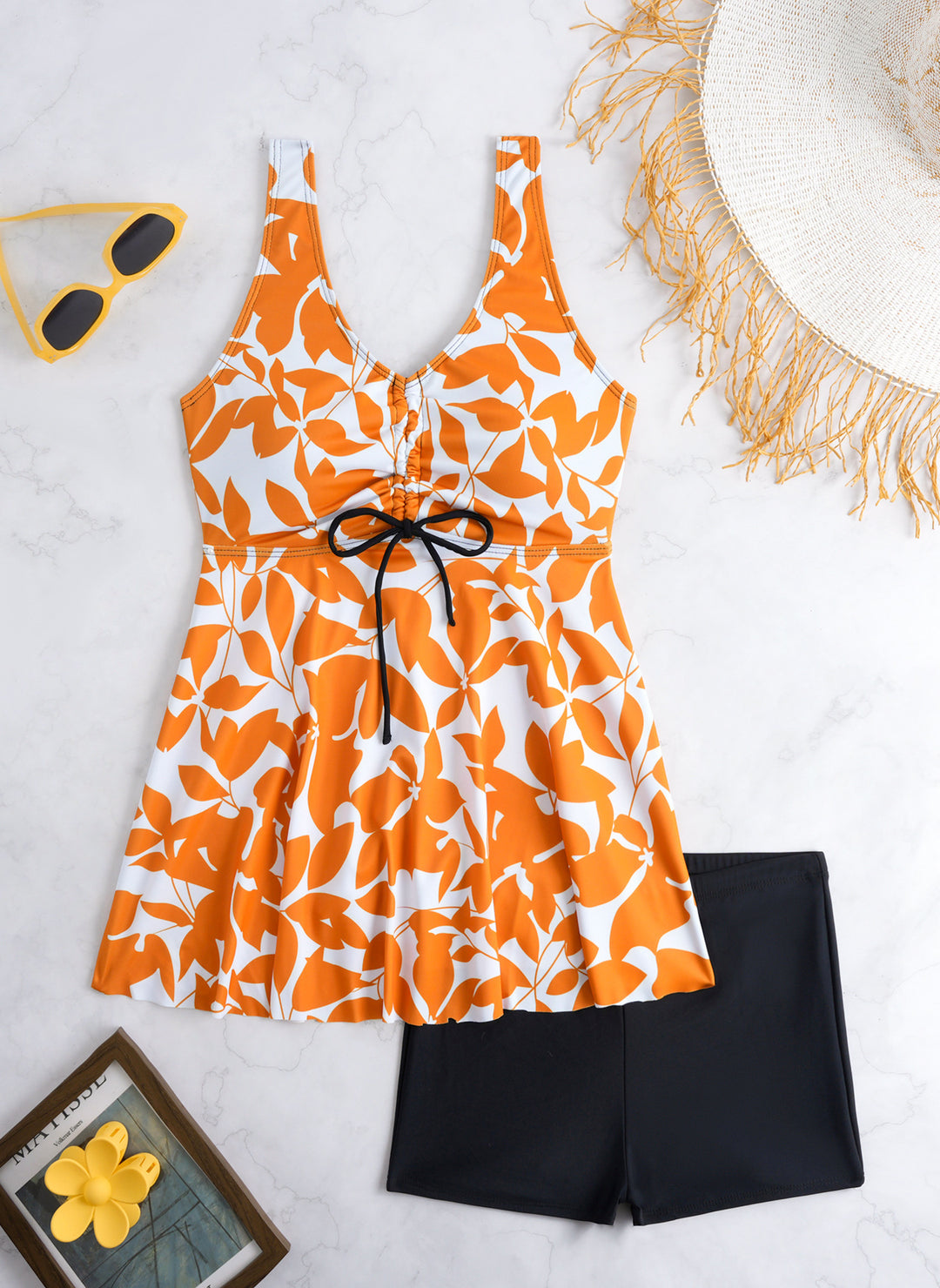 Ladies' tankini set with stylish ruffle and graphic peacock pattern StylebySassy