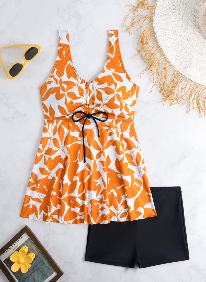 Ladies' tankini set with stylish ruffle and graphic peacock pattern StylebySassy