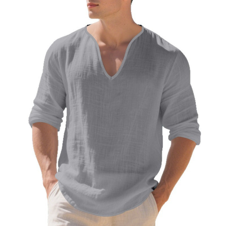 Men's lightweight linen V-neck shirt with a loose fit and roll-up sleeves StylebySassy