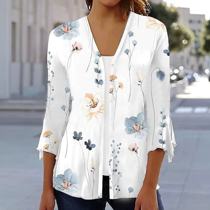 Women's light chiffon blouse with watercolor flower print, V-neck, button placket and three-quarter sleeves StylebySassy