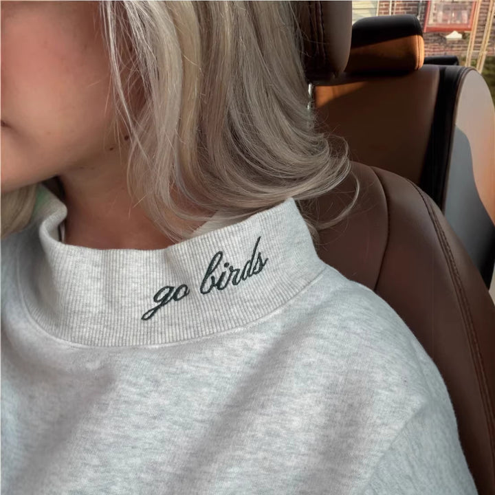 Women's oversized college sweatshirt with high stand-up collar and sewn-on lettering StylebySassy