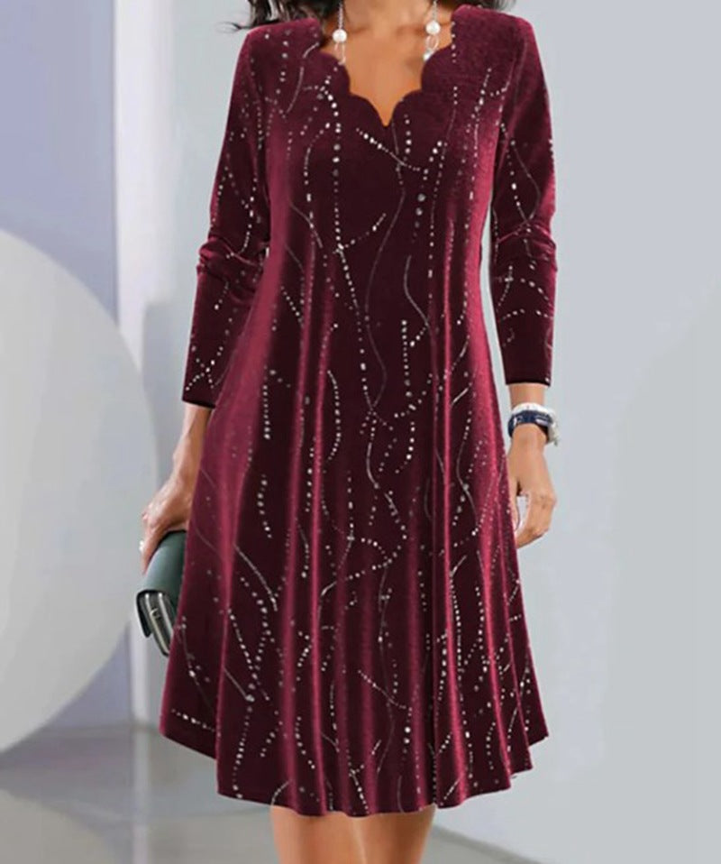 Women's satin A-line dress with curved neckline and rhinestone embellishment StylebySassy