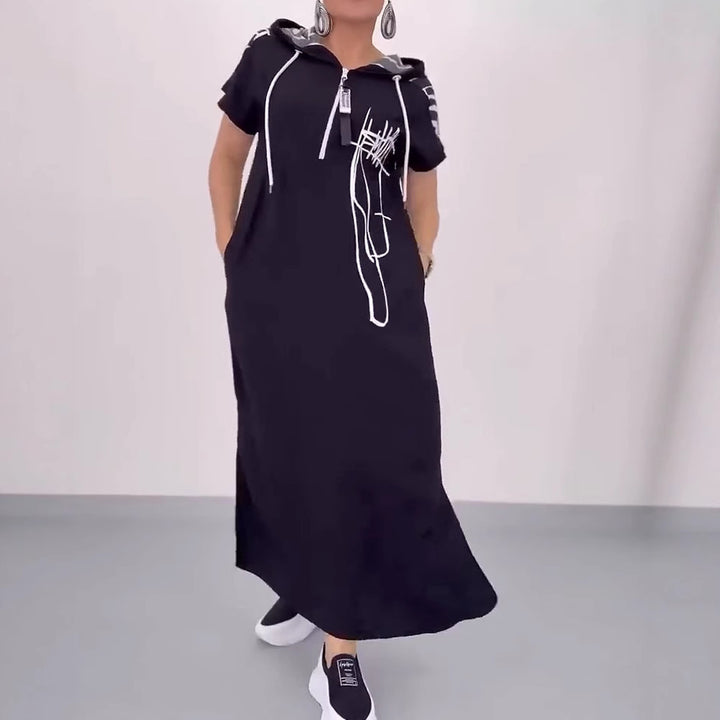 Women's casual hooded kaftan dress in loose fit with short sleeve cut and abstract graphic pattern StylebySassy
