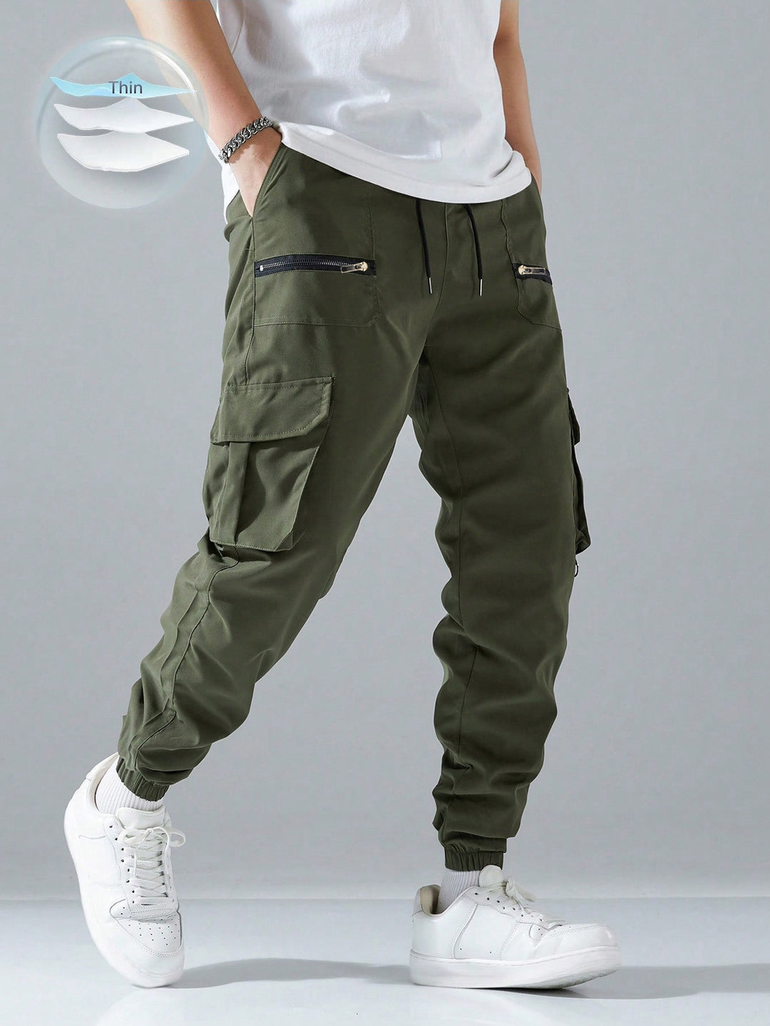Men's slim cargo joggers with multiple zippered pockets, elastic ankle cuff, and drawstring StylebySassy