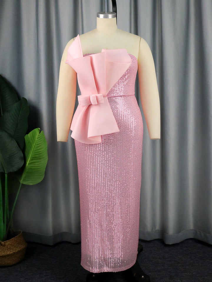Women's glittering evening dress with asymmetric design and extravagant ruffles StylebySassy