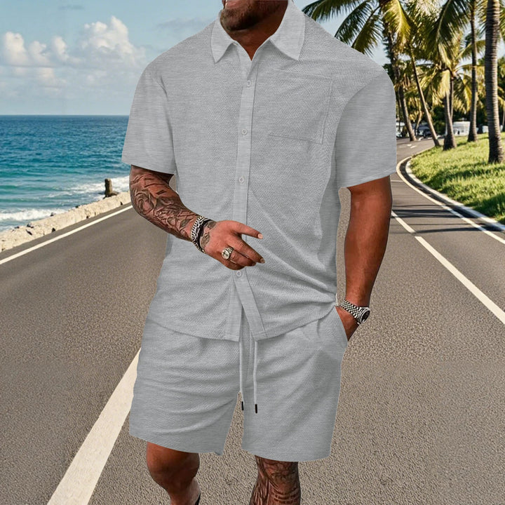 Men's buttoned leisure set with shirt collar herringbone structure chest pocket and drawstring shorts StylebySassy