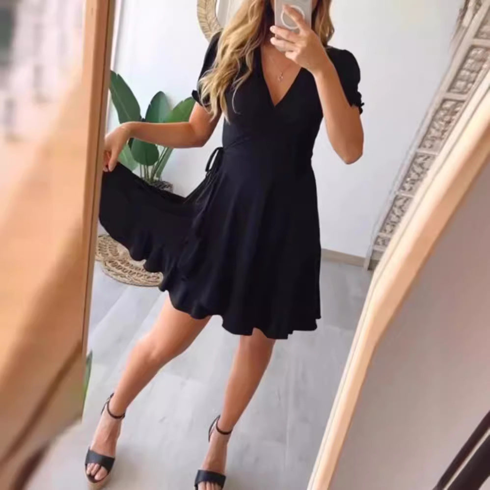 Women’s light wrap dress with V-neck, short sleeves, waist tie, and flounce skirt StylebySassy