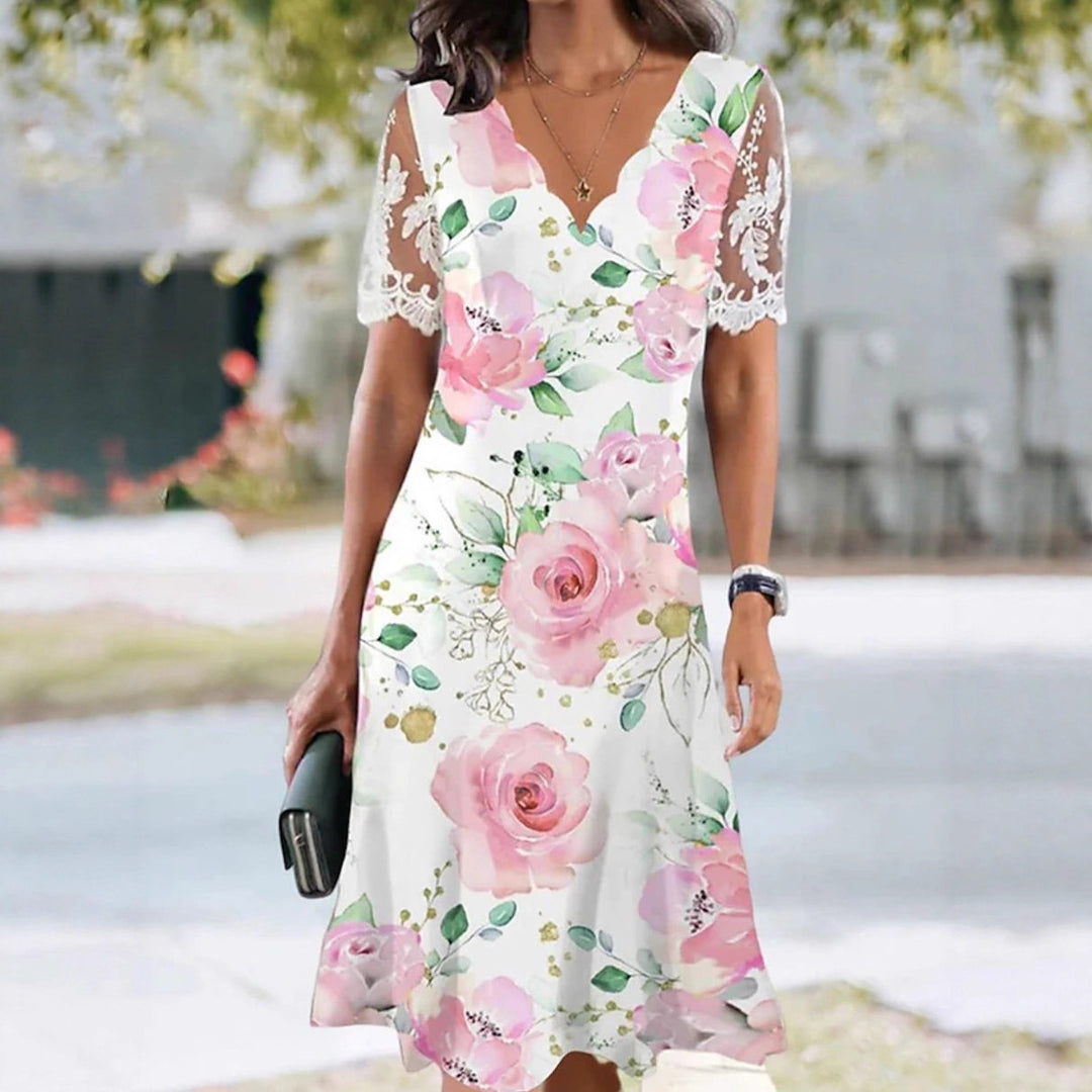 Ladies flowing midi beach dress with wavy V-neck and sheer lace sleeves StylebySassy