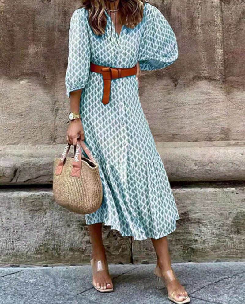 Women's lightweight patterned midi dress with V-neck, button placket, tiered skirt, and balloon sleeves StylebySassy